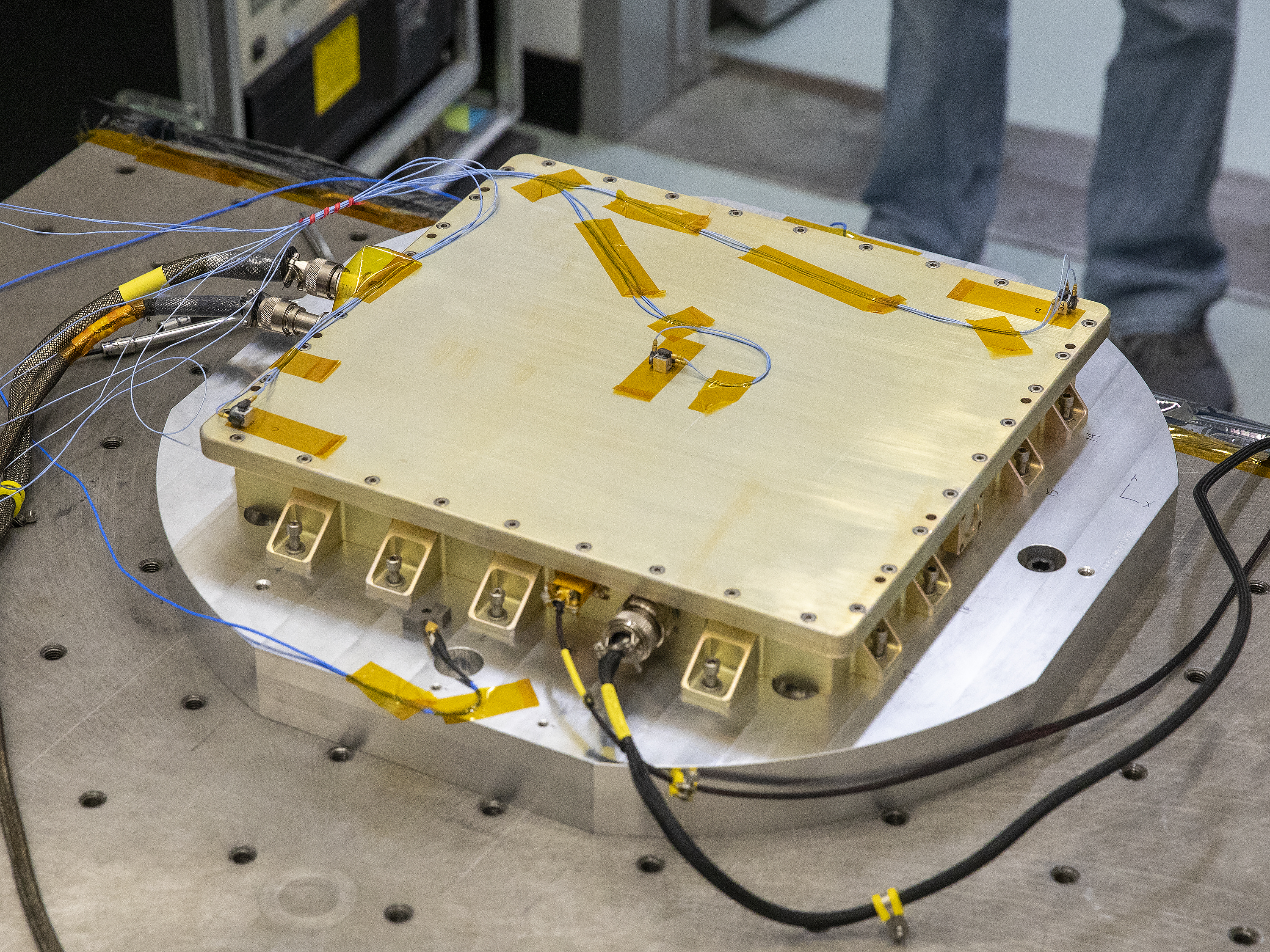 The CLARREO Pathfinder Team at LaRC completes assembly of the Power Converter Unit (PCU), which is responsible for directing power to the rest of the payload.  