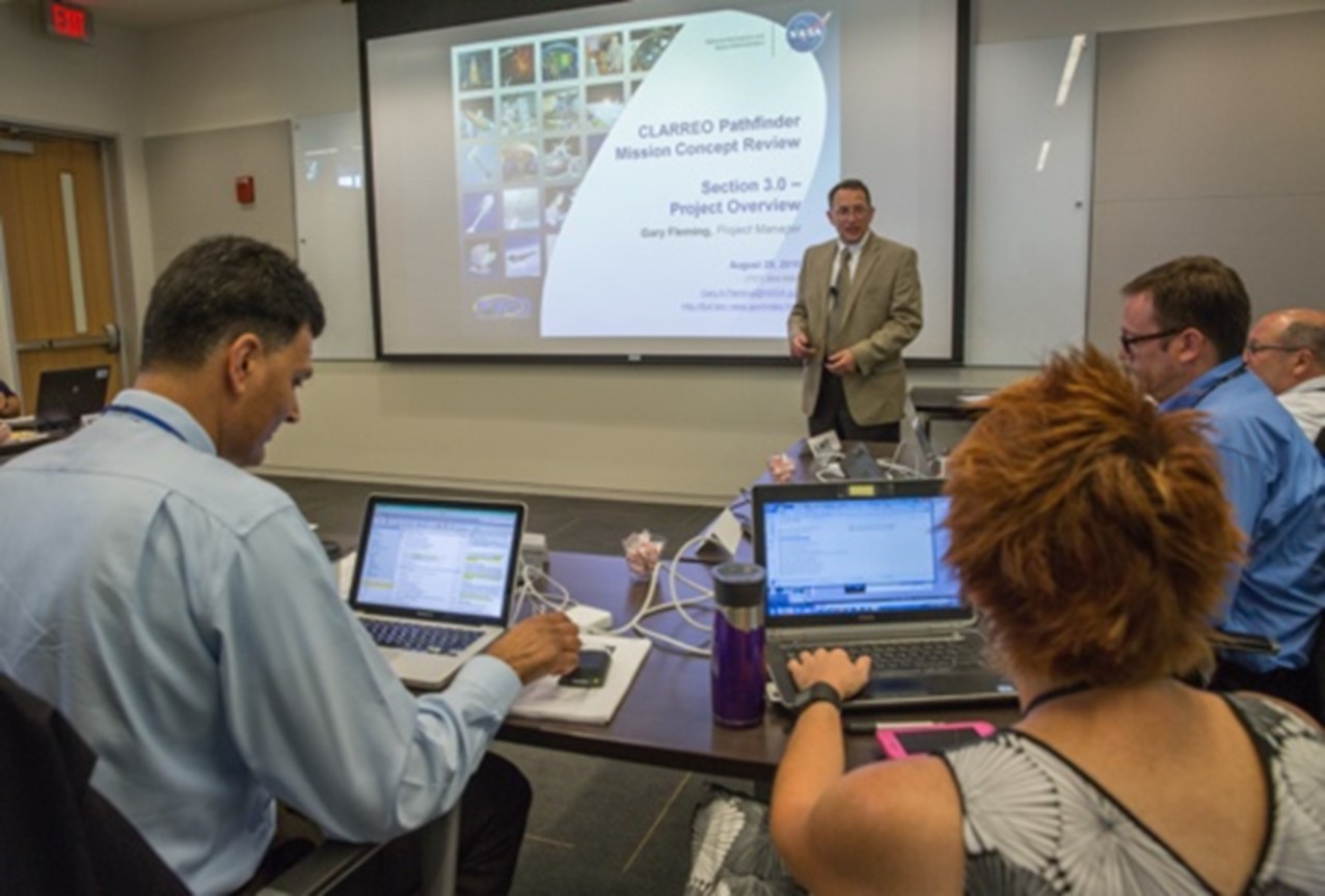 Gary Fleming presents at 2016 Mission Concept Review (MCR). Credits: NASA