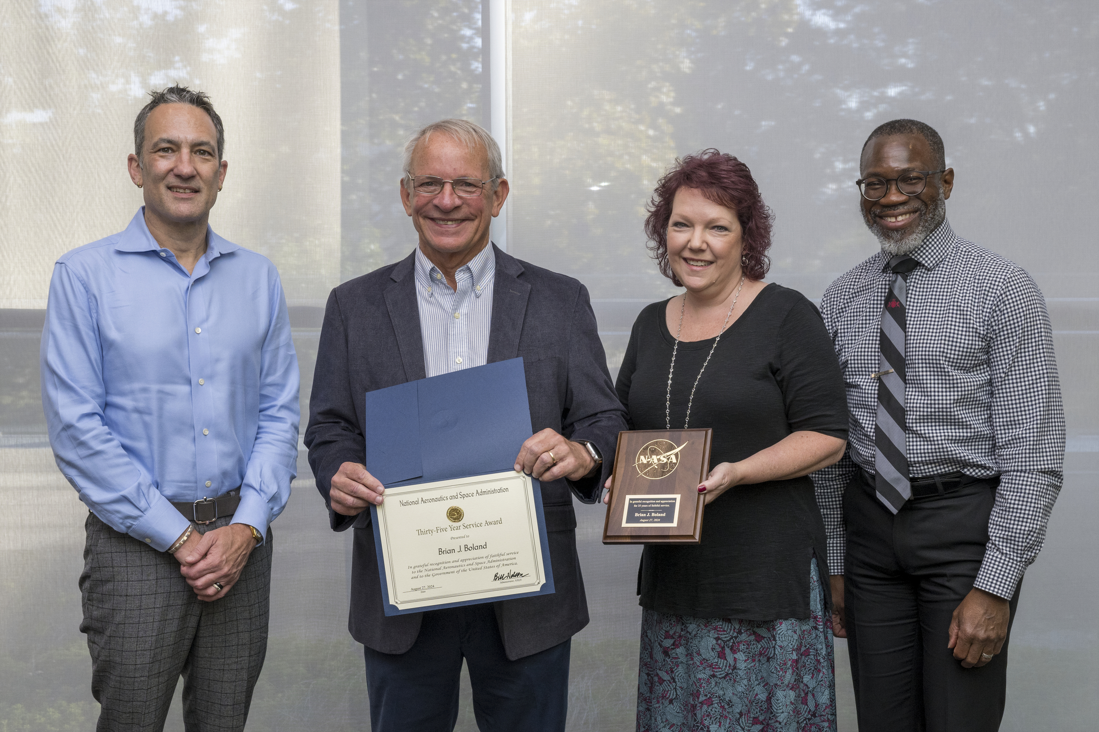 CPF Lead Systems Engineer Brian Boland receives a 35-year Service Award in recognition and appreciation of his service to NASA and to the government of the United States of America. Thank you and congratulations, Brian! Photo credit: NASA LaRC