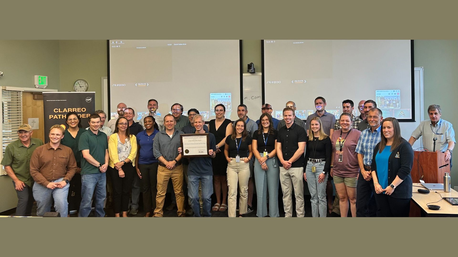 NASA presented its prestigious Group Achievement Award to the CLARREO Pathfinder (CPF) HySICS Characterization and Test Team in a ceremony held at the Laboratory for Atmospheric and Space Physics (LASP) at the University of Colorado Boulder on Sept. 17. The award recognized the team’s groundbreaking efforts in developing and testing the Hyperspectral Imager for Climate Science (HySICS)—an instrument that will provide highly accurate measurements of reflected solar radiation, which is critical to understanding Earth’s changing climate.